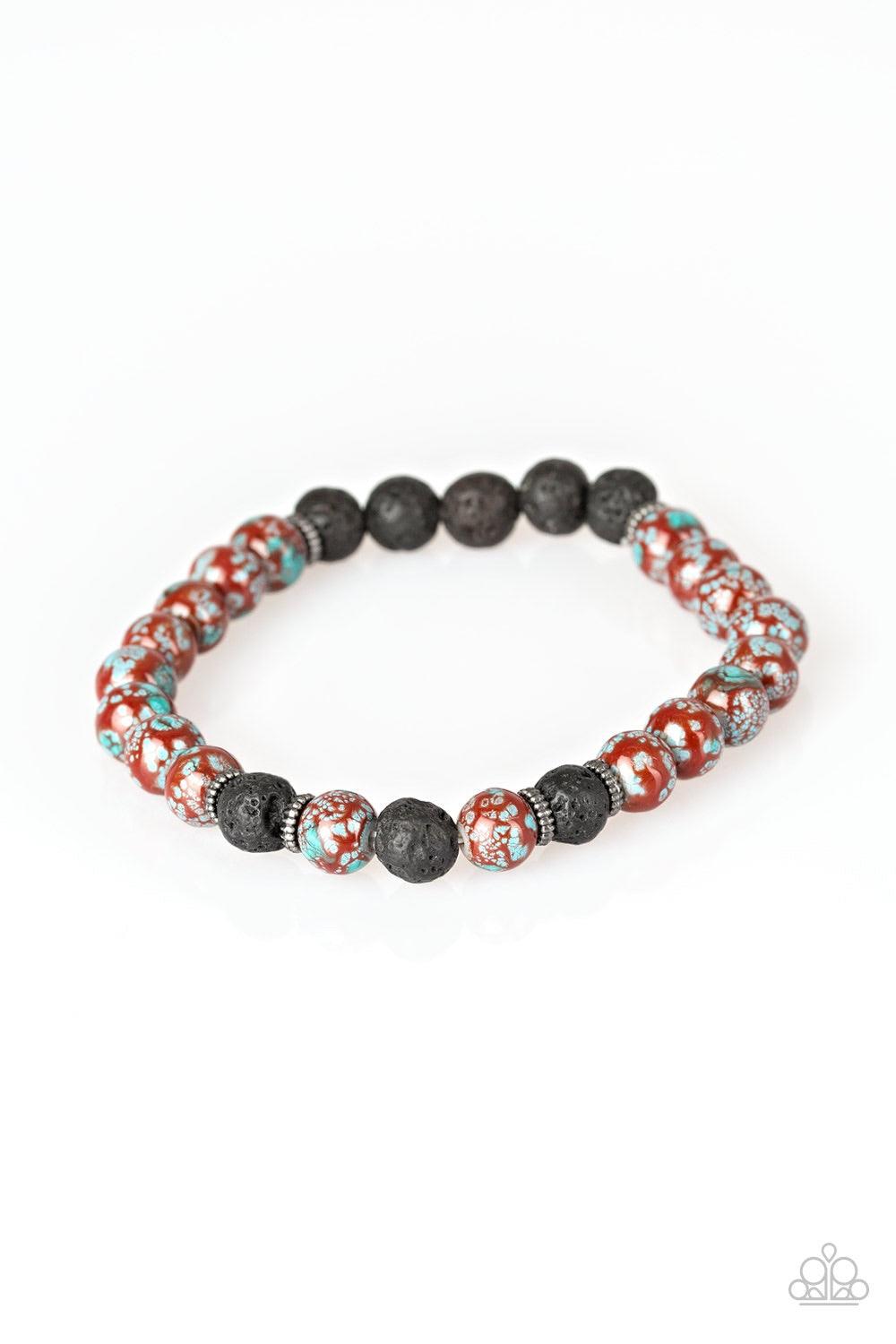 Paparazzi Accessories Joy - Red Infused with silver accents, earthy lava rocks and speckled stone beads are threaded along a stretchy band for a seasonal look. Jewelry