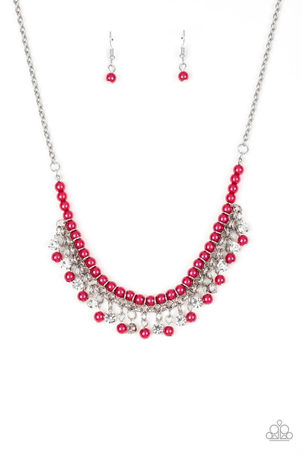 Paparazzi Accessories A Touch of CLASSY - Pink Infused with silver chain, vivacious pink pearls are threaded along an invisible wire below the collar. Matching pink pearls and glittery white rhinestones swing from the pearly strand, creating a flirtatious