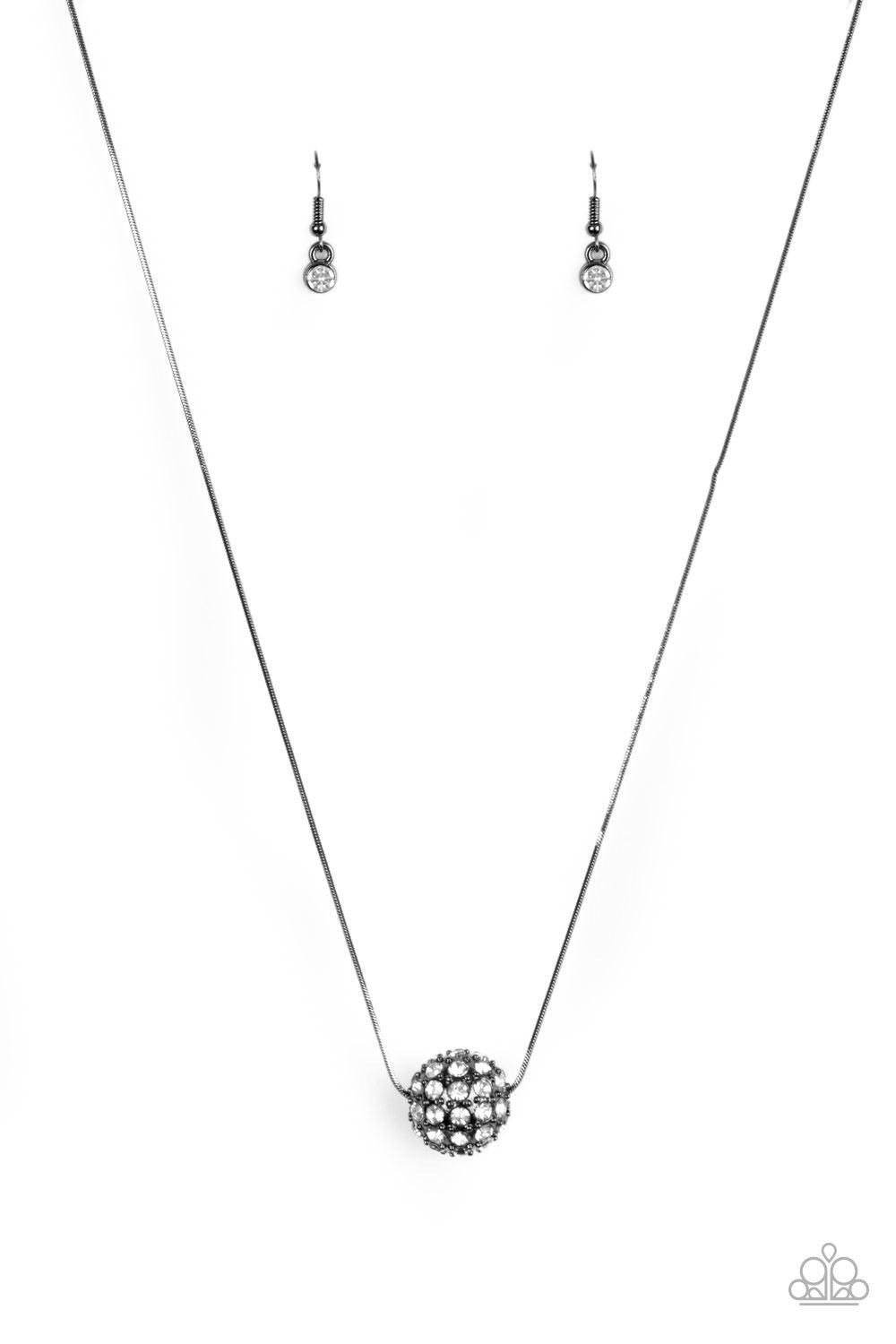 Paparazzi Accessories Come out of Your BOMBSHELL - Black Bedazzled in glittery white rhinestones, a dramatic gunmetal bead slides along a sleek gunmetal chain below the collar for a statement-making look. Features an adjustable clasp closure. Sold as one