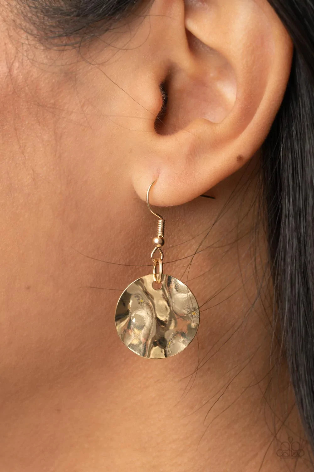 Paparazzi Accessories Alluring Luxe - Brown Shining wavy gold discs and brown leather discs adorn a trio of lengthened subtly shimmering brown cords. Rows of dainty gold cylinders are threaded along the bottom of each cord adding luxurious allure to the p