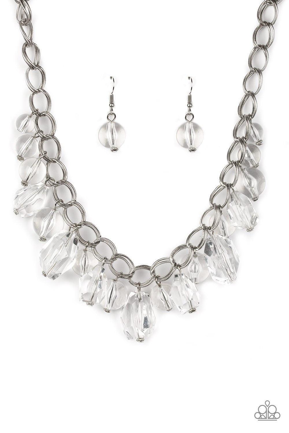 Paparazzi Accessories Gorgeously Globetrotter - White Varying in shape and shimmer, smooth and faceted glassy beads trickle from doubled silver chain links, creating a glamorous fringe below the collar. Features an adjustable clasp closure. Sold as one in