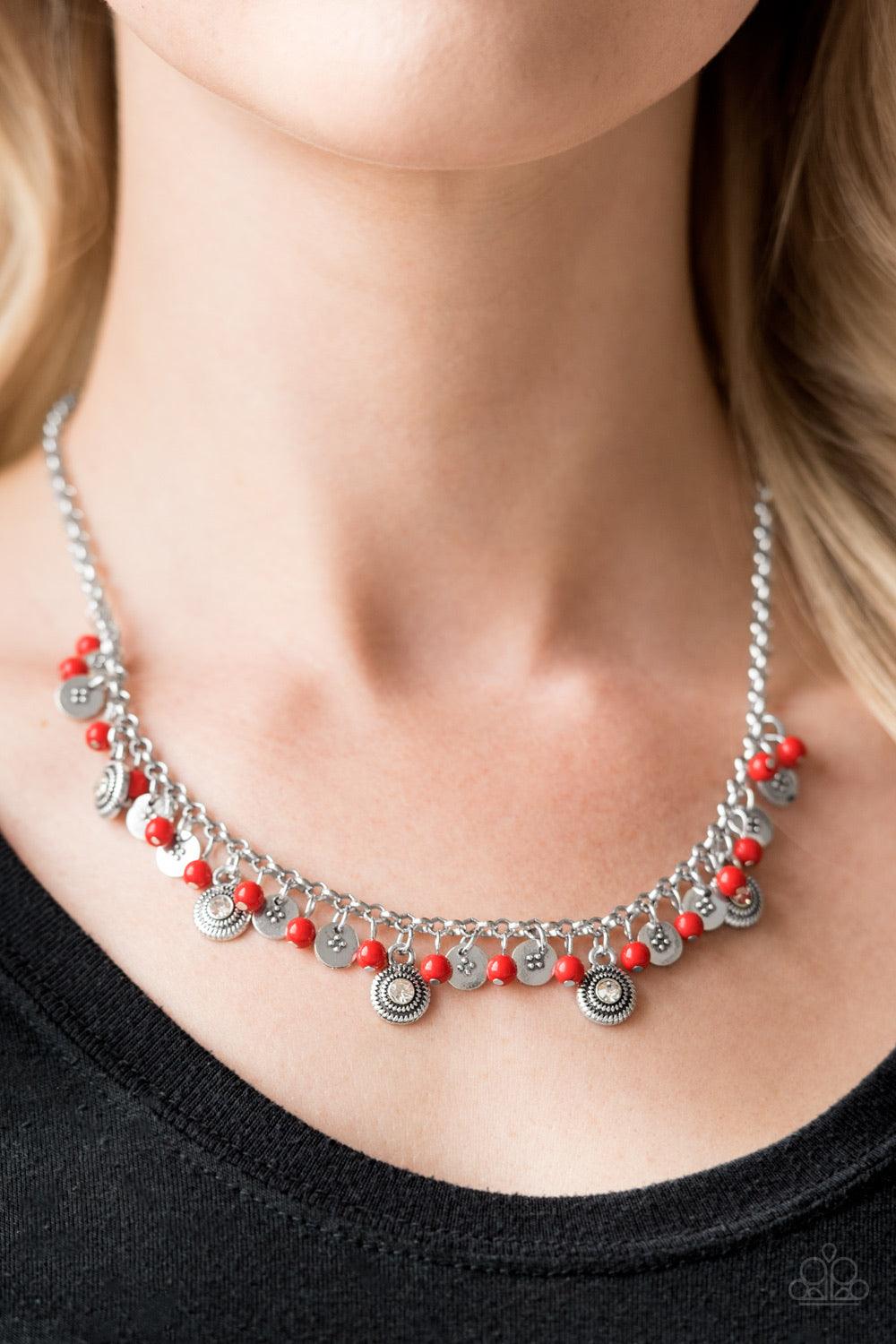 Paparazzi Accessories Fashion Formal - Red Dainty red beads and ornate silver discs swing from the bottom of a shimmery silver chain, creating a casual fringe below the collar. Featuring rhinestone centers, textured silver discs are sprinkled between refi