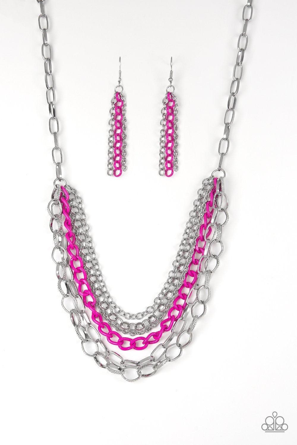 Paparazzi Accessories Color Bomb - Pink Mismatched silver chains layer below the collar for a bold industrial look. Painted in a flirty finish, a shiny pink chain drapes between the shimmery silver chains for a vivacious finish. Features an adjustable cla