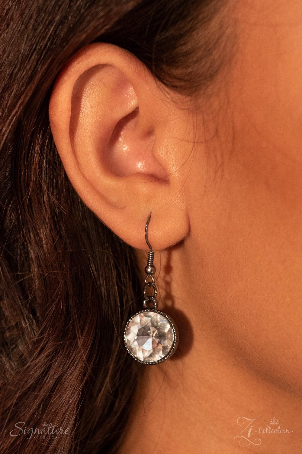 Paparazzi Accessories The Angela Oversized white rhinestones are pressed into studded gunmetal frames, creating a gorgeous collision of glamour and edge. The glittery gems are grouped in small clusters as they swing from a gunmetal chain, resulting in a f