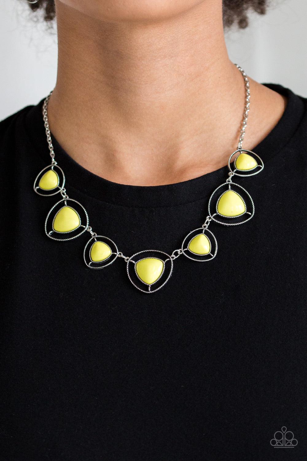 Paparazzi Accessories Make A Point - Yellow Varying in size, pyramidal yellow beads are encased in airy silver frames and linked below the collar for a trendsetting look. Features an adjustable clasp closure. Jewelry