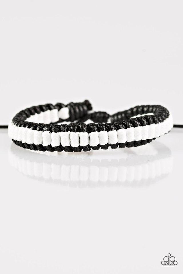 Paparazzi Accessories Trail Tracker - White Black and white cording weaves into a knotted braid around the wrist for an urban look. Features an adjustable sliding knot closure. Sold as one individual bracelet. Jewelry