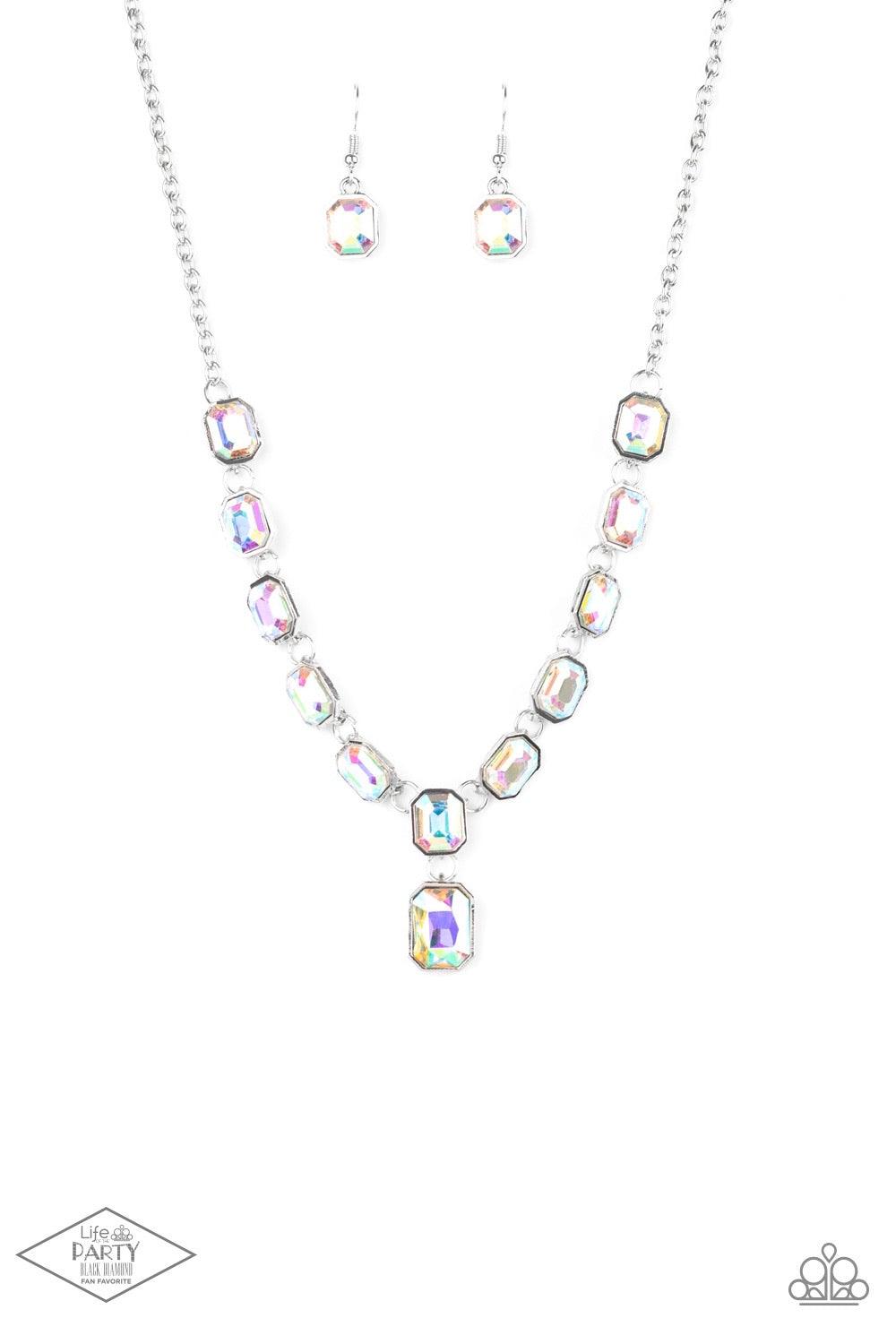 Paparazzi Accessories The Right To Remain - Multi Featuring regal emerald style cuts, glittery iridescent gems link below the collar in an undeniably sparkly fashion. A slightly larger iridescent gem swings from the center, creating an eye-catching pendan
