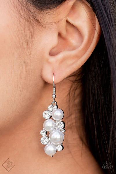Paparazzi Accessories Fond of Baubles - White Vivaciously bubbly pearls and glittering white rhinestones flawlessly meld into abstract oval frames creating an elegant lure. Earring attaches to a standard fishhook fitting. Sold as one pair of earrings. Jew
