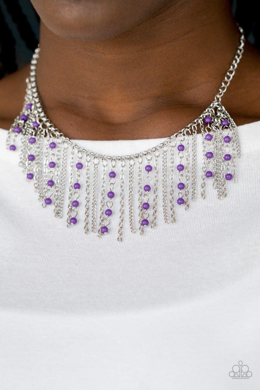 Paparazzi Accessories Harlem Hideaway - Purple Infused with purple beaded tassels, shimmery silver chains stream below the collar, creating a colorful fringe. Features an adjustable clasp closure. Sold as one individual necklace. Includes one pair of matc