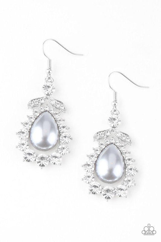 Paparazzi Accessories Award Winning Shimmer - Silver Gradually increasing in size near the center, glassy white rhinestones join around a pearly silver teardrop center. A solitaire white rhinestone and leafy silver frame crown the top of the frame for a g