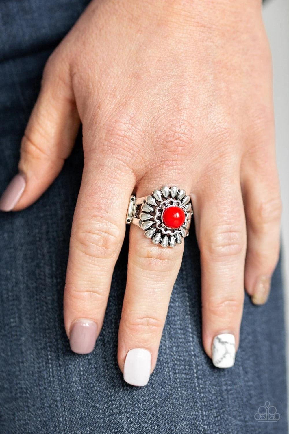 Paparazzi Accessories Poppy Pep - Red A fiery red bead is nestled atop a stacked floral frame, creating a colorful flower atop the finger. Features a stretchy band for a flexible fit. Sold as one individual ring. Jewelry