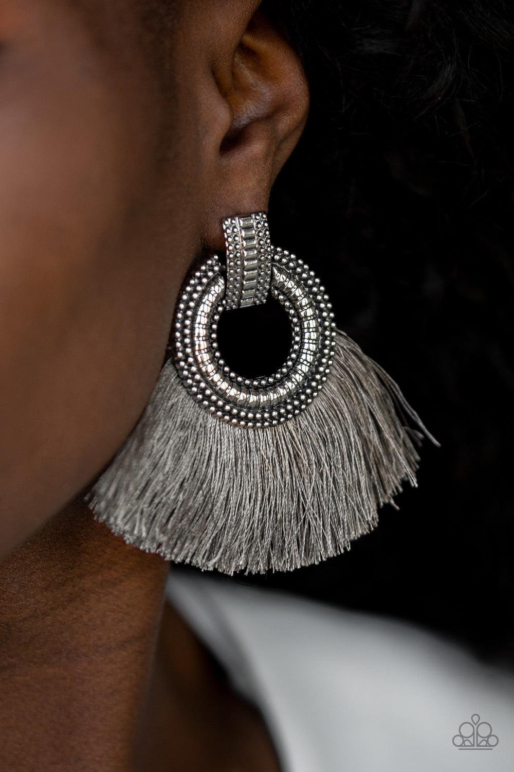 Paparazzi Accessories I Am Spartacus - Silver A plume of shiny gray thread flares out from the bottom of an ornate silver fitting, creating a fierce fringe. Earring attaches to a standard post fitting. Jewelry