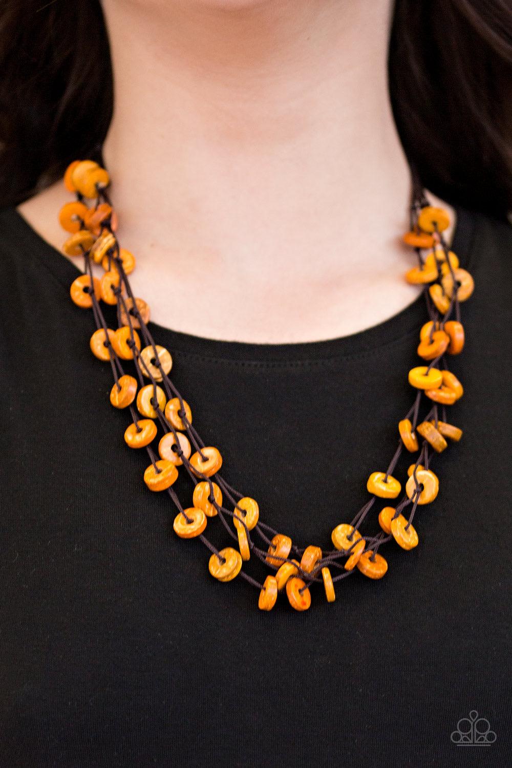 Paparazzi Accessories Hoppin Honolulu - Orange Tinted in a vivacious orange finish, distressed wooden discs trickle along strands of knotted brown cording, creating colorful layers below the collar for a seasonal vibe. Features a button-loop closure. Jewe