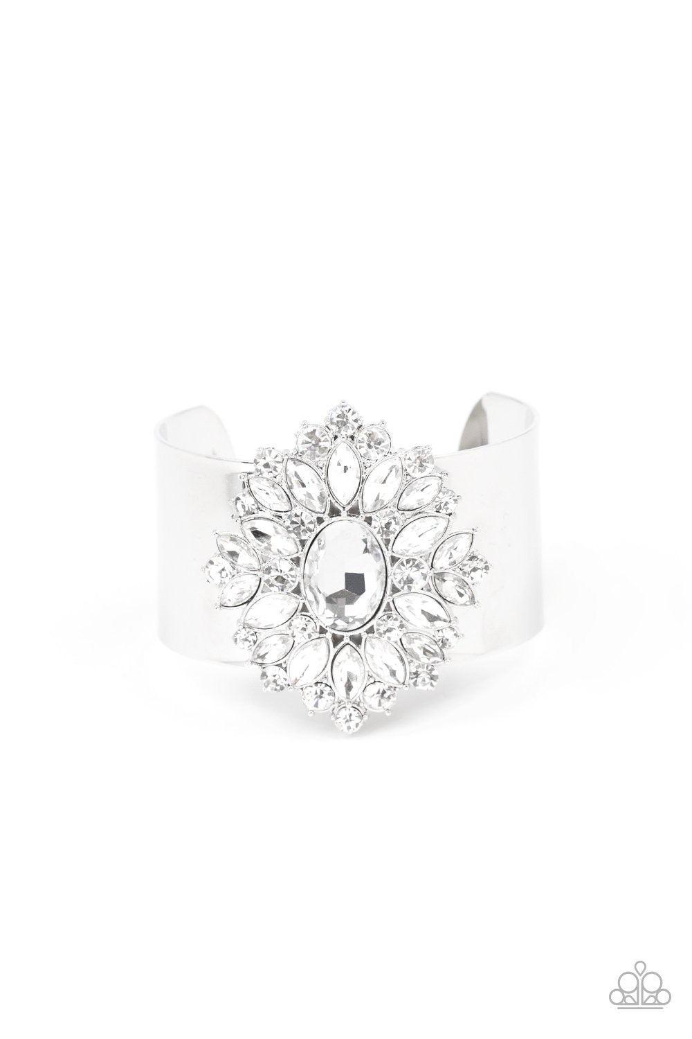 Paparazzi Accessories The Fashionmonger - White Featuring round and marquise style cuts, an explosion of sparkling white rhinestones flare from an oval gem, creating a glamorous floral pendant atop a thick silver cuff. Jewelry