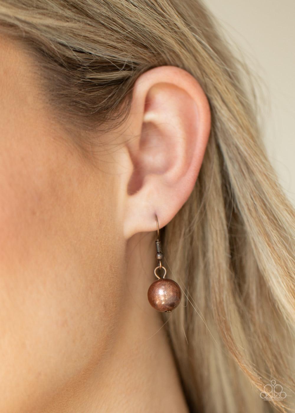 Paparazzi Accessories Twinkle Twinkle, I’m The Star ~Copper Brushed in a stellar iridescence, hammered copper beads, classic copper beads, and antiqued copper discs gradually increase in size as they join below the collar for a glamorous look. Features an