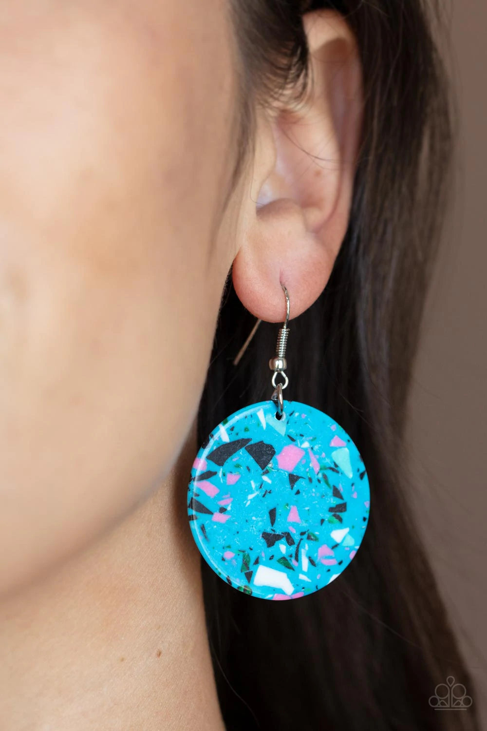 Paparazzi Accessories Tenaciously Terrazo - Blue Featuring a colorful terrazzo finish, a faux blue stone disc swings from the ear for a modern look. Earring attaches to a standard fishhook fitting. Sold as one pair of earrings. Jewelry