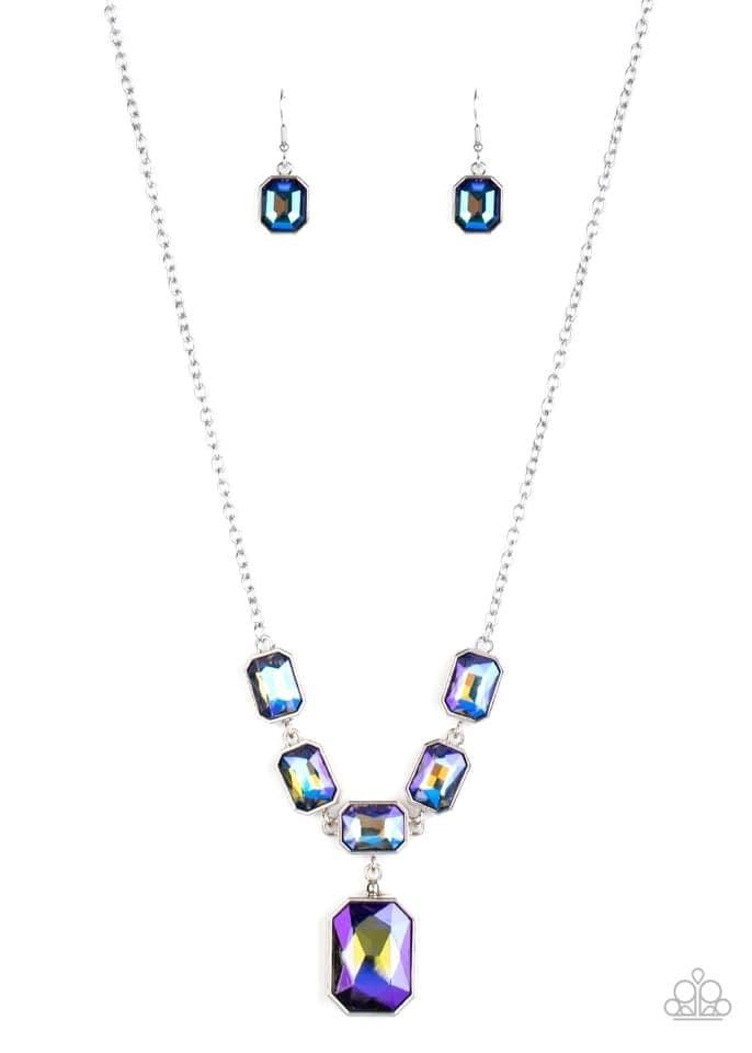 Paparazzi Accessories Million Dollar Moment - Multi Featuring an out-of-this-world iridescence, emerald-cut blue gems delicately link below the collar. Attached to a dainty silver chain, the glittering row of rhinestones gives way to a dramatically oversi