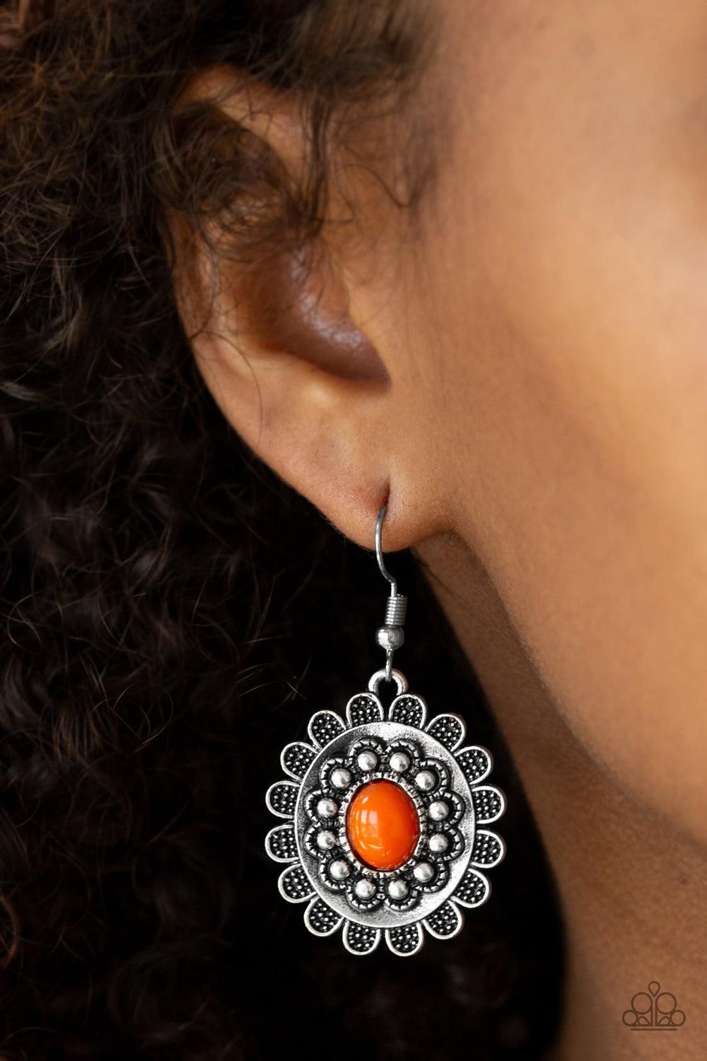 Paparazzi Accessories Summer Blooms - Orange A vivacious orange bead is pressed into the center of an ornate floral frame for a summery look. Earring attaches to a standard fishhook fitting. Jewelry