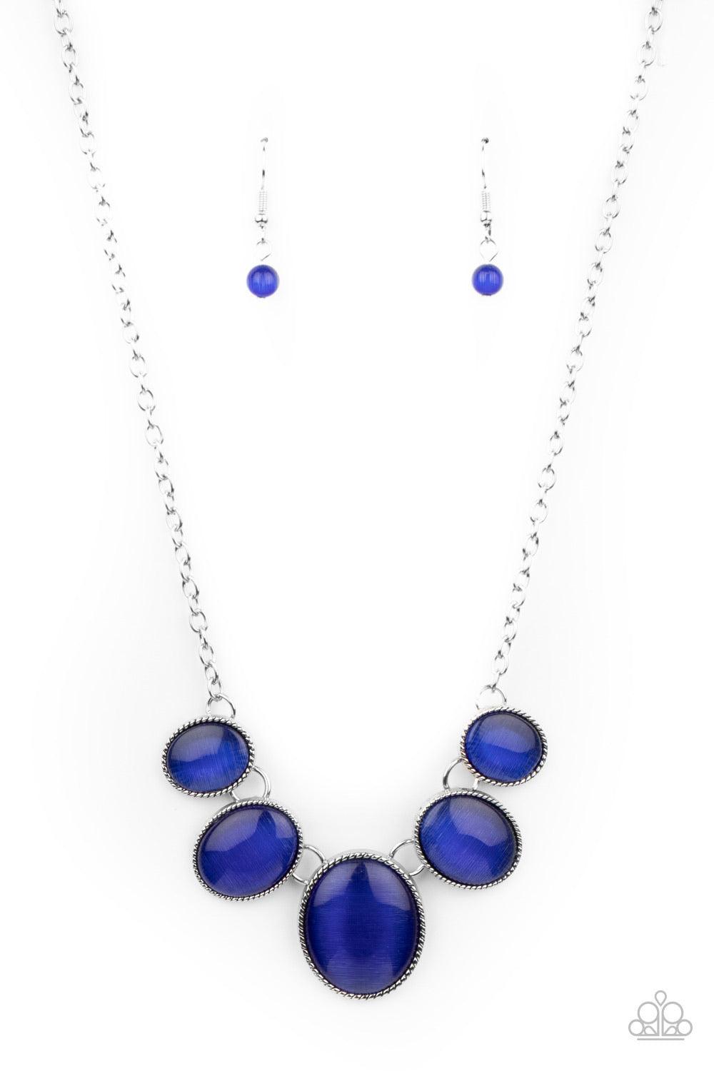 Paparazzi Accessories One Can Only Gleam - Blue Gradually increasing in size, a dainty collection of glowing blue cat's eye oval stones delicately link below the collar for a whimsical pop of color. Features an adjustable clasp closure. Sold as one indivi