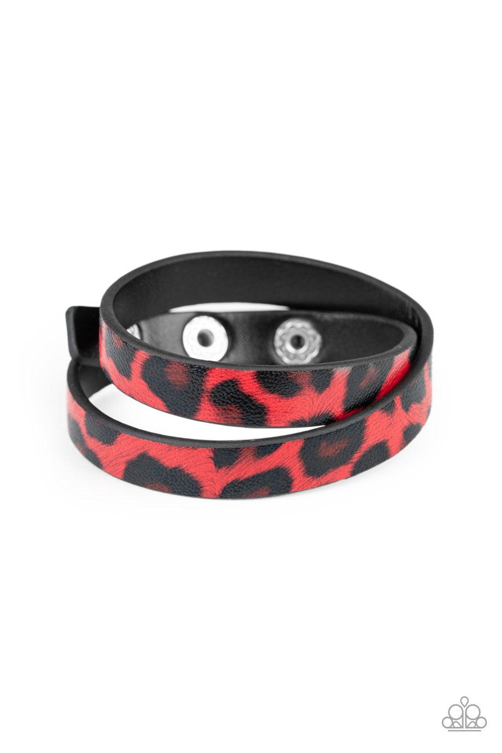 Paparazzi Accessories All GRRRirl - Red Featuring a red and black cheetah pattern, a strip of black leather double wraps around the wrist for a wild look. Features an adjustable snap closure. Jewelry