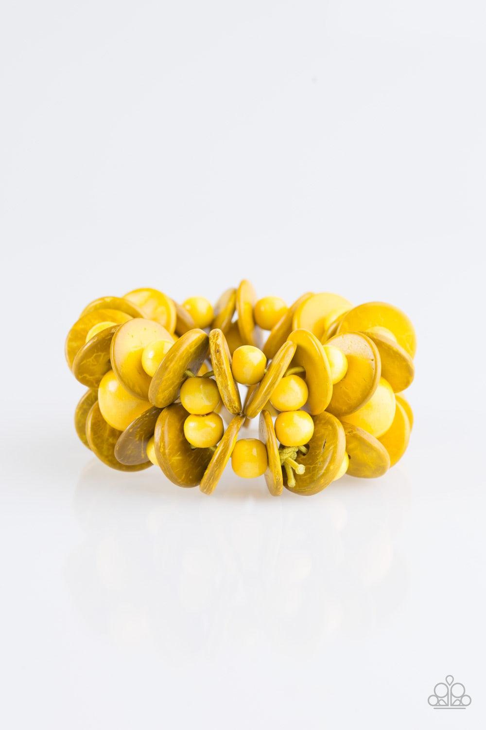 Paparazzi Accessories Tropical Temptress - Yellow Vivacious yellow wooden accents are threaded along elastic stretchy bands, creating a seasonal look around the wrist. Jewelry