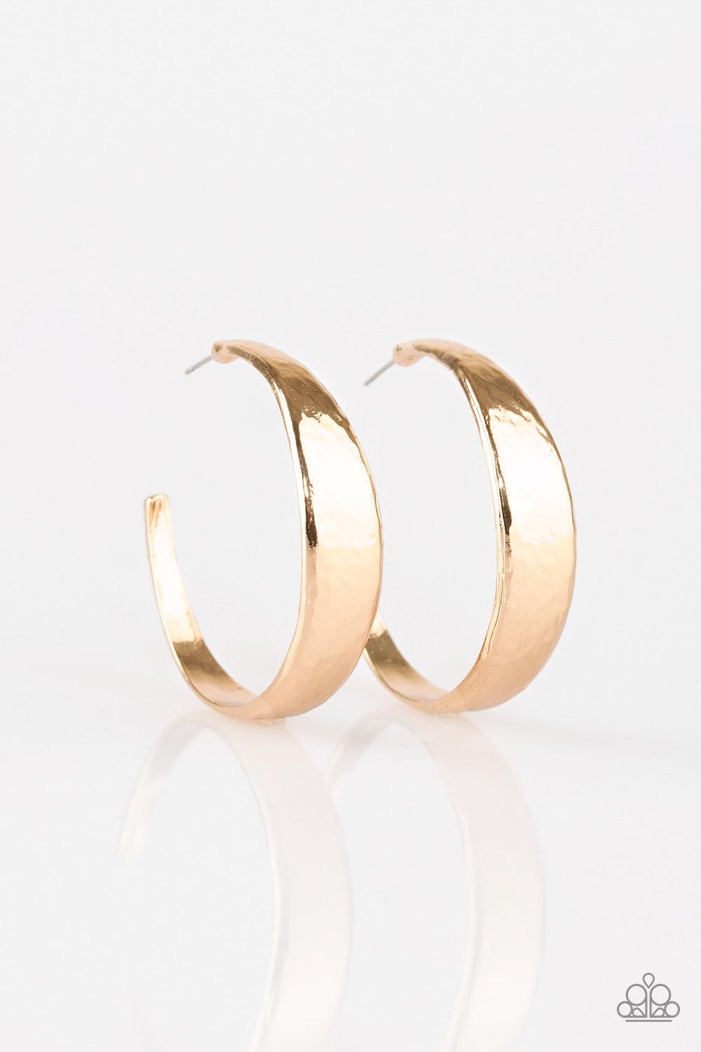 Paparazzi Accessories Hoop and Holler - Gold Delicately hammered in shimmery textures, a thick gold hoop curls around the ear for a casual look. Earring attaches to a standard post fitting. Hoop measures 1 3/4" in diameter. Sold as one pair of hoop earrin