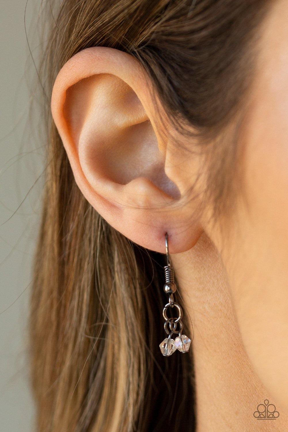Paparazzi Accessories Treasures And Trinkets ~Black nfused with sporadic sections of dainty crystal-like beads, three dainty gunmetal chains layer down the chest. A dainty gunmetal frame swings from the uppermost chain, while a hammered pendant featuring