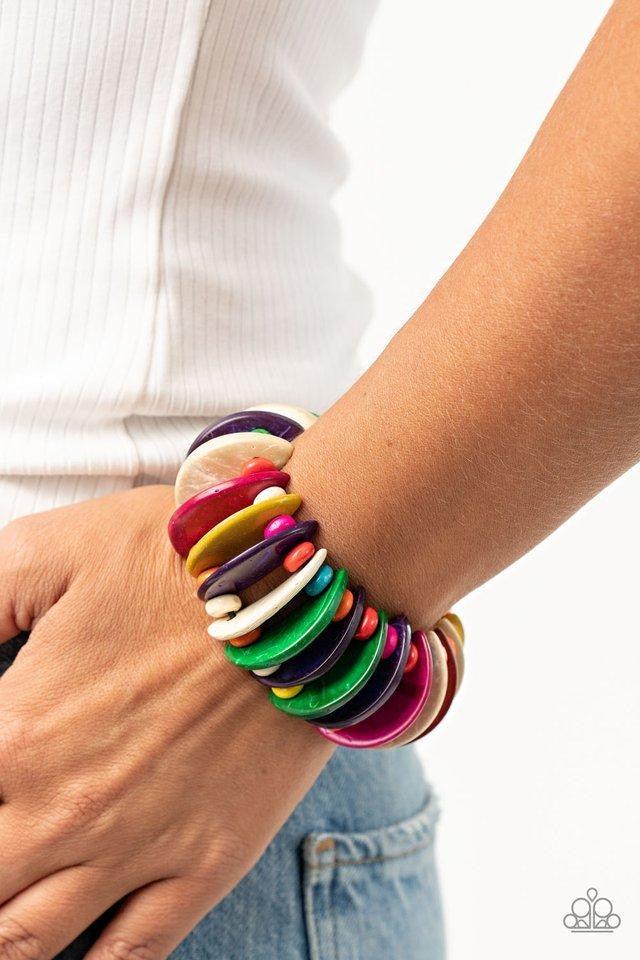 Paparazzi Accessories Tropical Tiki Bar - Multi Infused with multicolored wooden beads, distressed multicolored wooden crescents are threaded along stretchy bands around the wrist for a summery look. Sold as one individual bracelet. Jewelry