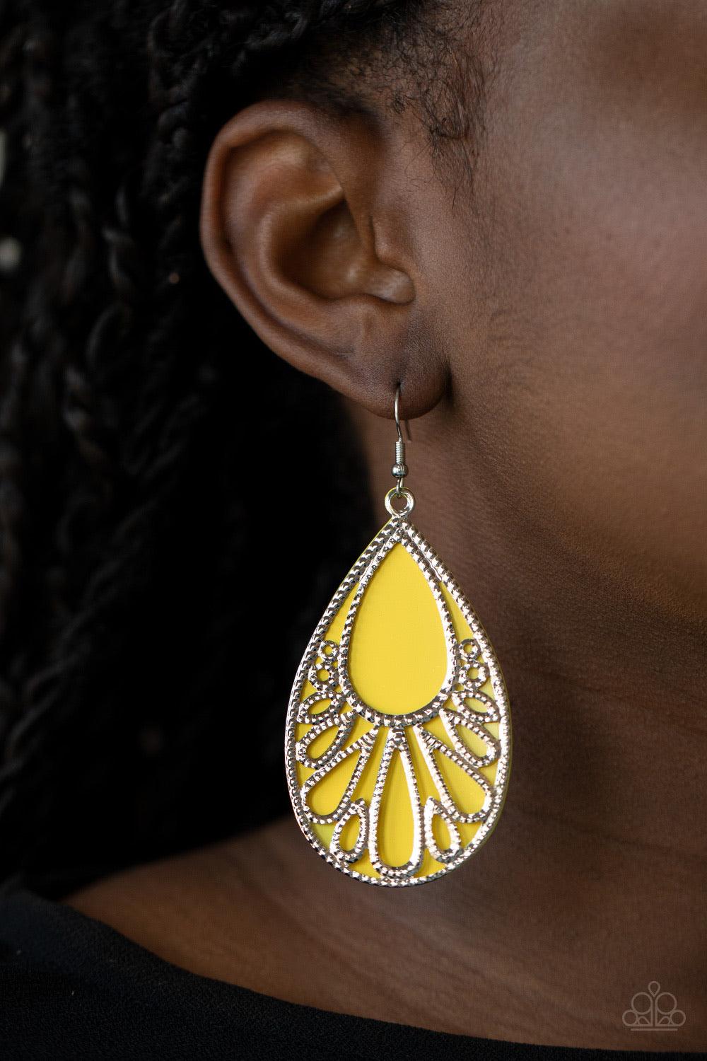 Paparazzi Accessories Loud And Proud - Yellow Stenciled with studded filigree, an airy silver teardrop overlaps atop a yellow acrylic teardrop frame, creating a flamboyant lure. Earring attaches to a standard fishhook fitting. Sold as one pair of earrings