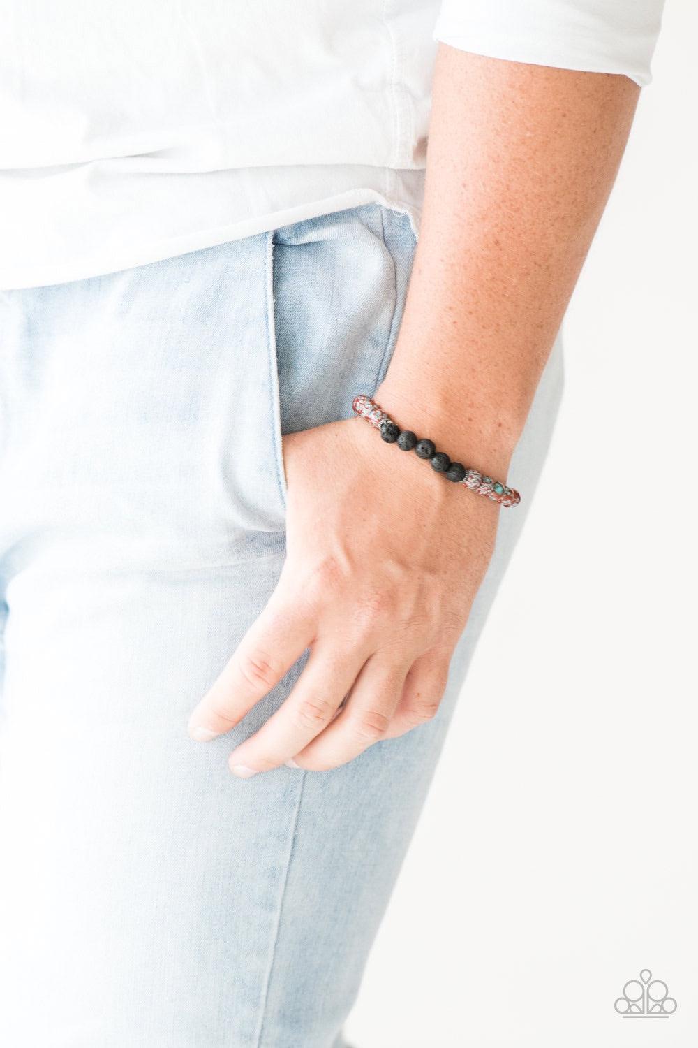 Paparazzi Accessories Joy - Red Infused with silver accents, earthy lava rocks and speckled stone beads are threaded along a stretchy band for a seasonal look. Jewelry