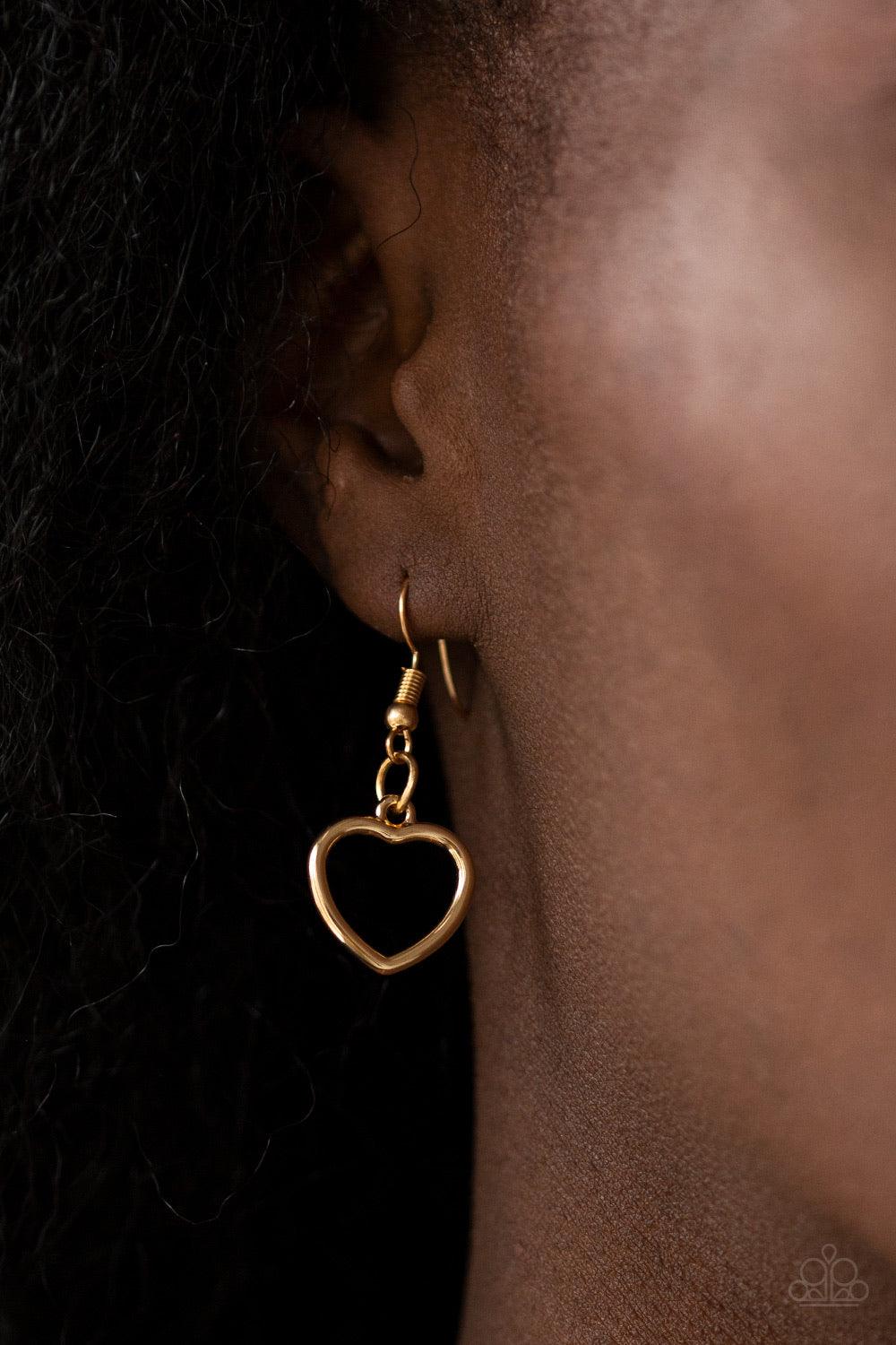 Paparazzi Accessories Hearty Hearts - Gold Gradually increasing in size, glistening gold heart silhouettes delicately link below the collar in a charming fashion. Features an adjustable clasp closure. Jewelry