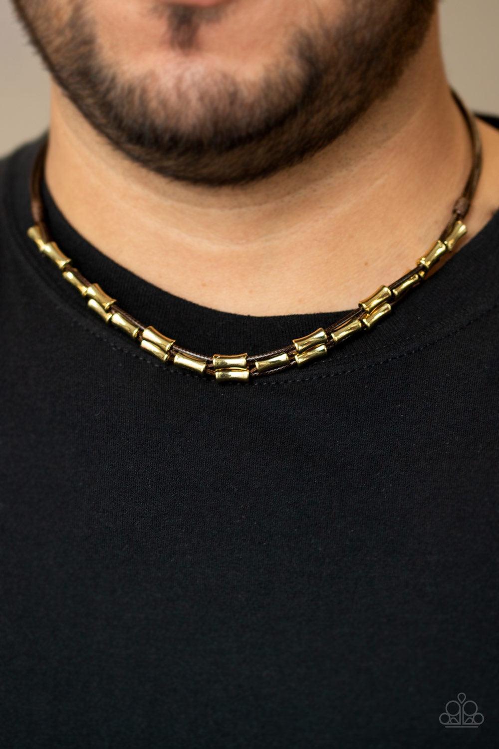 Paparazzi Accessories Moto Maverick - Brown Shiny brown cording weaves through a collection of glistening gold beads below the collar for an edgy, urban look. Features a button loop closure. Jewelry