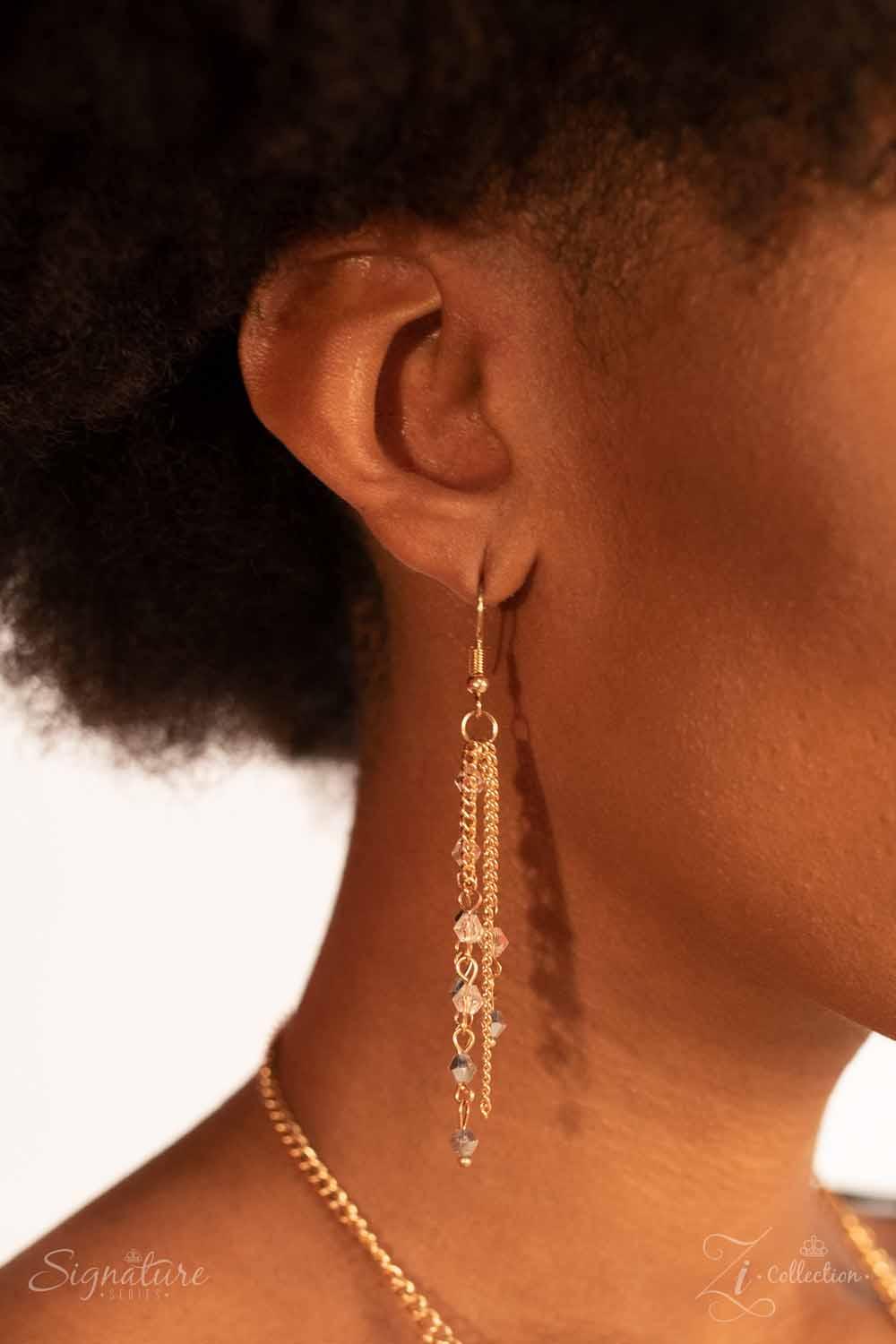 Paparazzi Accessories The DonnaLee Countless gold chains stream from the bottom of a glistening gold chain, creating a curtain of show-stopping fringe that falls just below the collar. Faceted crystal-like beading lays across the top of the cascading chai