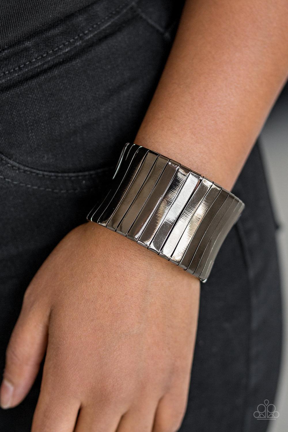 Paparazzi Accessories Urban Uptrend ~Black Flat gunmetal frames wrap around a gunmetal frame, creating a bold cuff around the wrist. Sold as one individual bracelet.