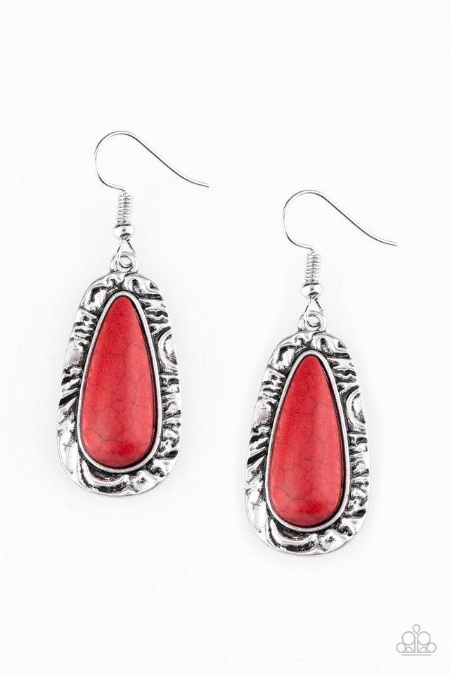 Paparazzi Accessories Cruzin Colorado - Red Chiseled into a tranquil teardrop, a fiery red stone is pressed into the center of a shimmery silver frame radiating with hammered details for an artisan inspired look. Earring attaches to a standard fishhook fi