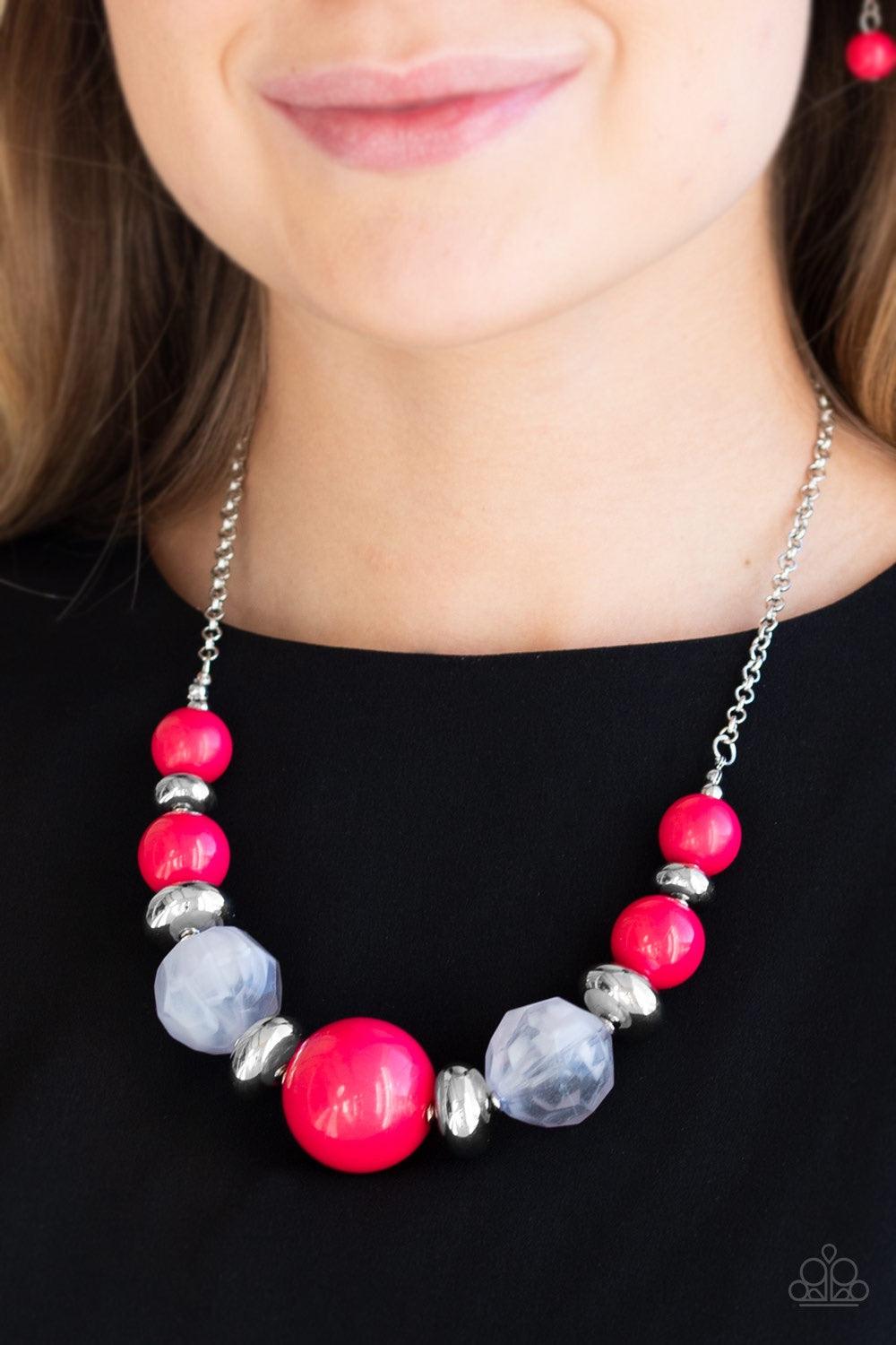 Paparazzi Accessories Daytime Drama - Pink Gradually increasing in size near the center, a collection of pink, silver, and cloudy beads join below the collar in a statement making fashion. Features an adjustable clasp closure. Jewelry