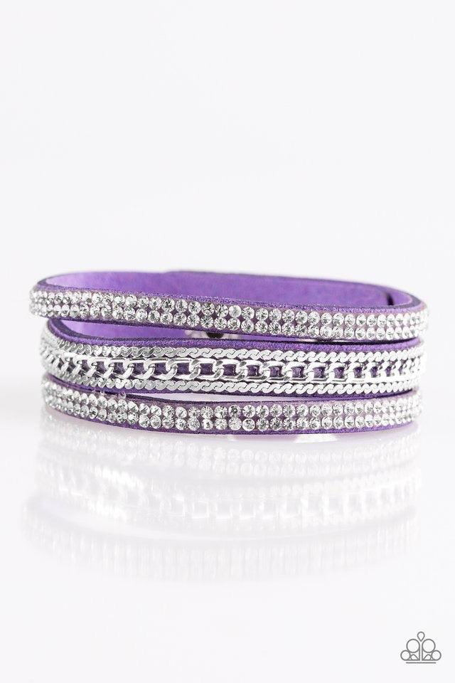 Paparazzi Accessories Unstoppable ~Purple Glassy white rhinestones and shimmery silver chains are encrusted along strands of purple suede, creating a mishmash of sassy shimmer around the wrist for a fierce look. Features an adjustable snap closure. Sold a