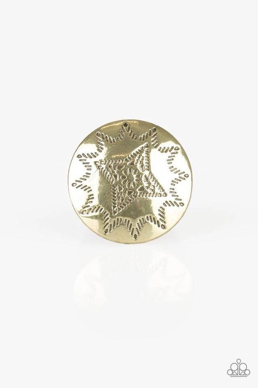Paparazzi Accessories Rural Radius - Brass Dotted in a radiant sunburst pattern, a shiny brass frame spins atop the finger for a seasonal look. Features a stretchy band for a flexible fit. Jewelry