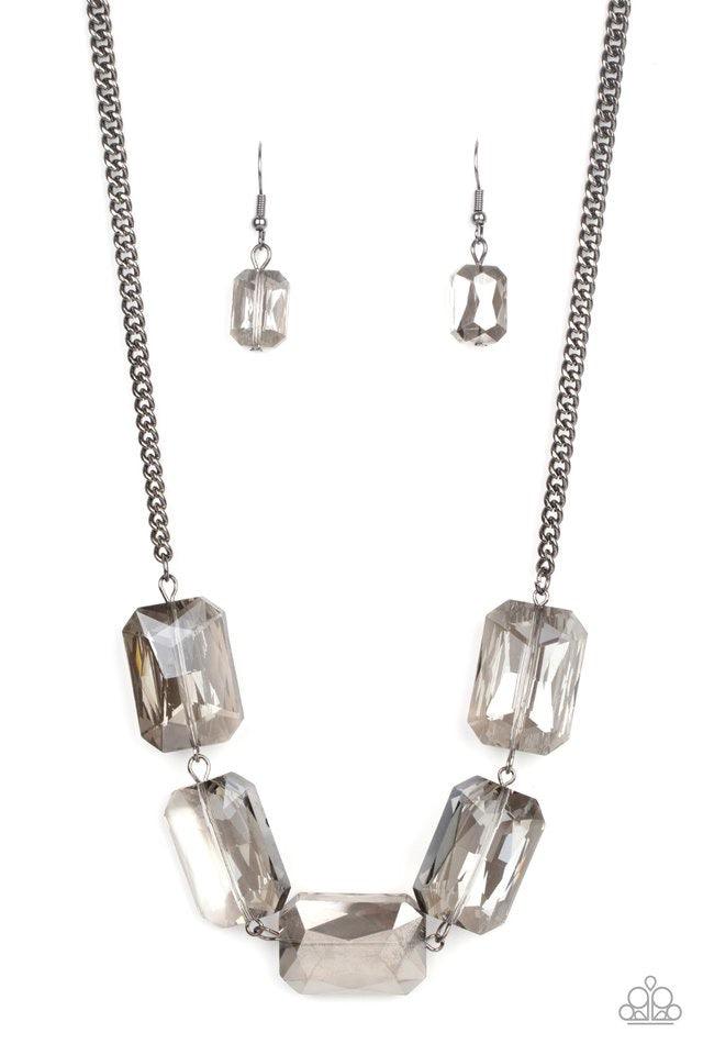 Paparazzi Accessories Heard It On The HEIR-Waves - Black Gorgeously oversized smoky emerald cut gems fabulously link below the collar, creating an iridescently icy statement piece. Features an adjustable clasp closure. Sold as one individual necklace. Inc