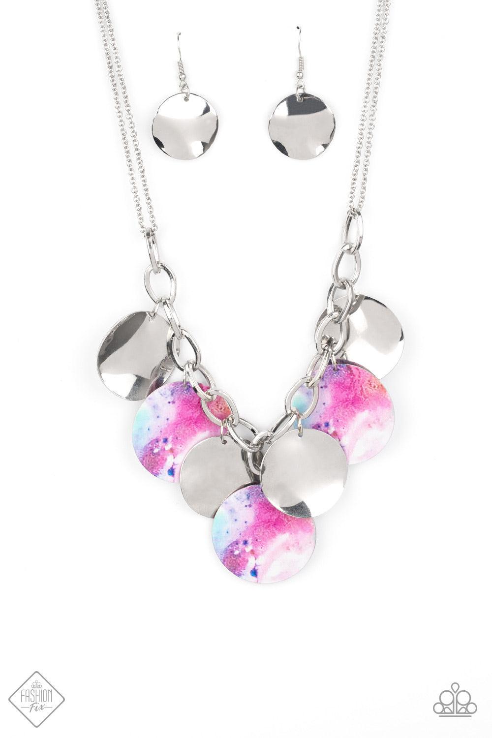 Paparazzi Accessories Tie Dye Drama ~Multi Featuring a galactic tie dye print, flat colorful discs swirled in tones of blue and purple combine with curved silver discs, swinging from the bottom of a bulky silver chain for a trendy throwback look. Features