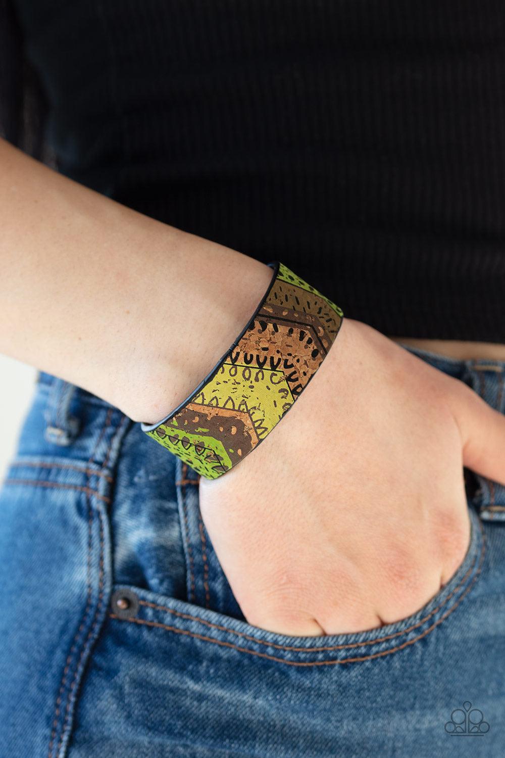 Paparazzi Accessories Come Uncorked - Green Featuring refreshing green accents, patches of cork-like textures coalesce across the front of a cuff for a tribal inspired look. Jewelry