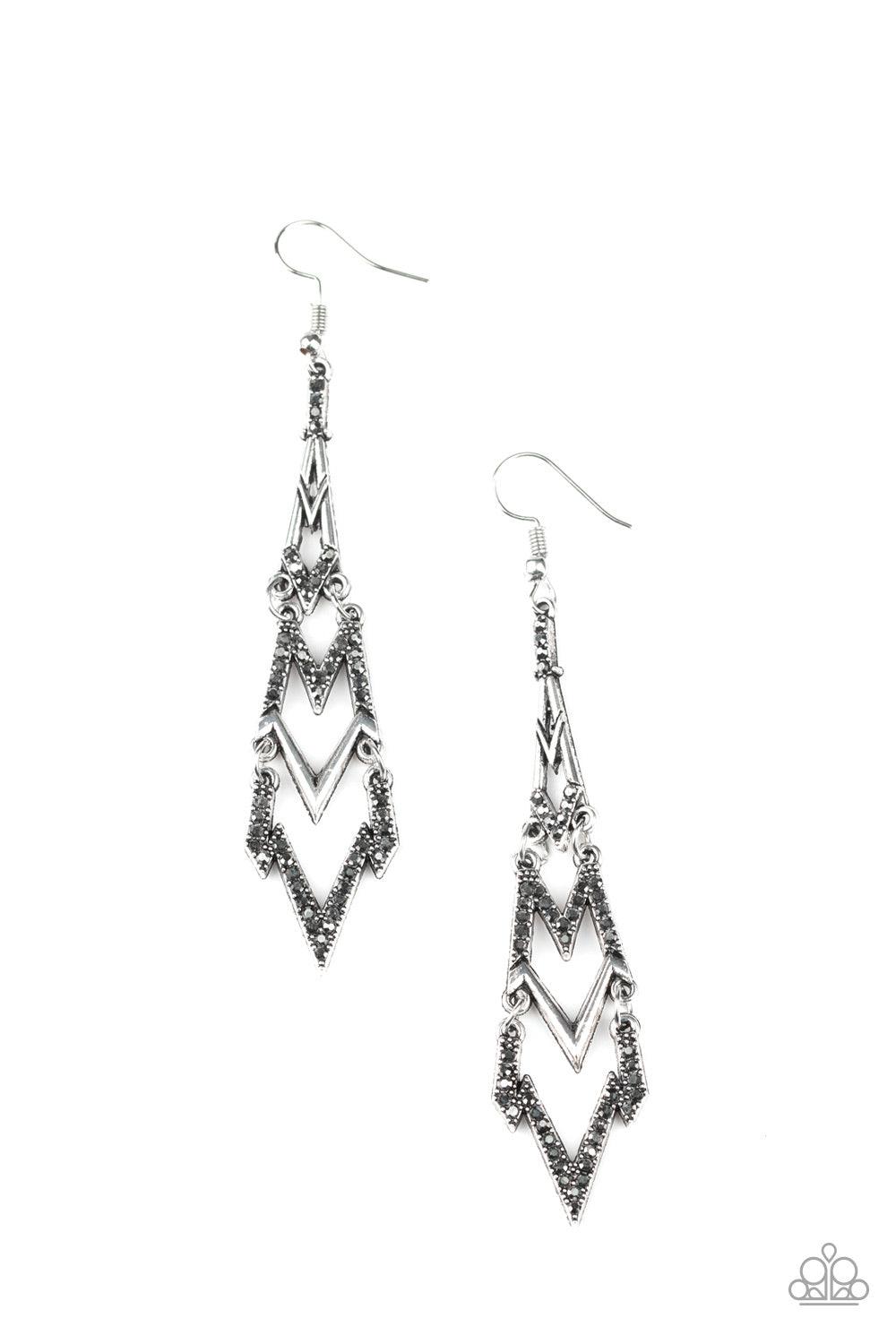 Paparazzi Accessories Electric Shimmer - Silver Featuring edgy zigzag shapes, plain silver and hematite rhinestone encrusted bars stack into an electrifying lure. Earring attaches to a standard fishhook fitting. Jewelry