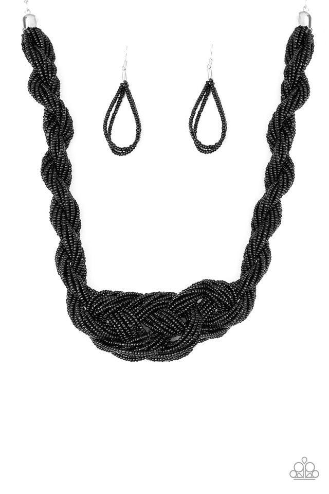 Paparazzi Accessories A Standing Ovation - Black Countless strands of black seed beads are twisted and knotted together to create an unforgettable statement piece. Features an adjustable clasp closure. Sold as one individual necklace. Includes one pair of