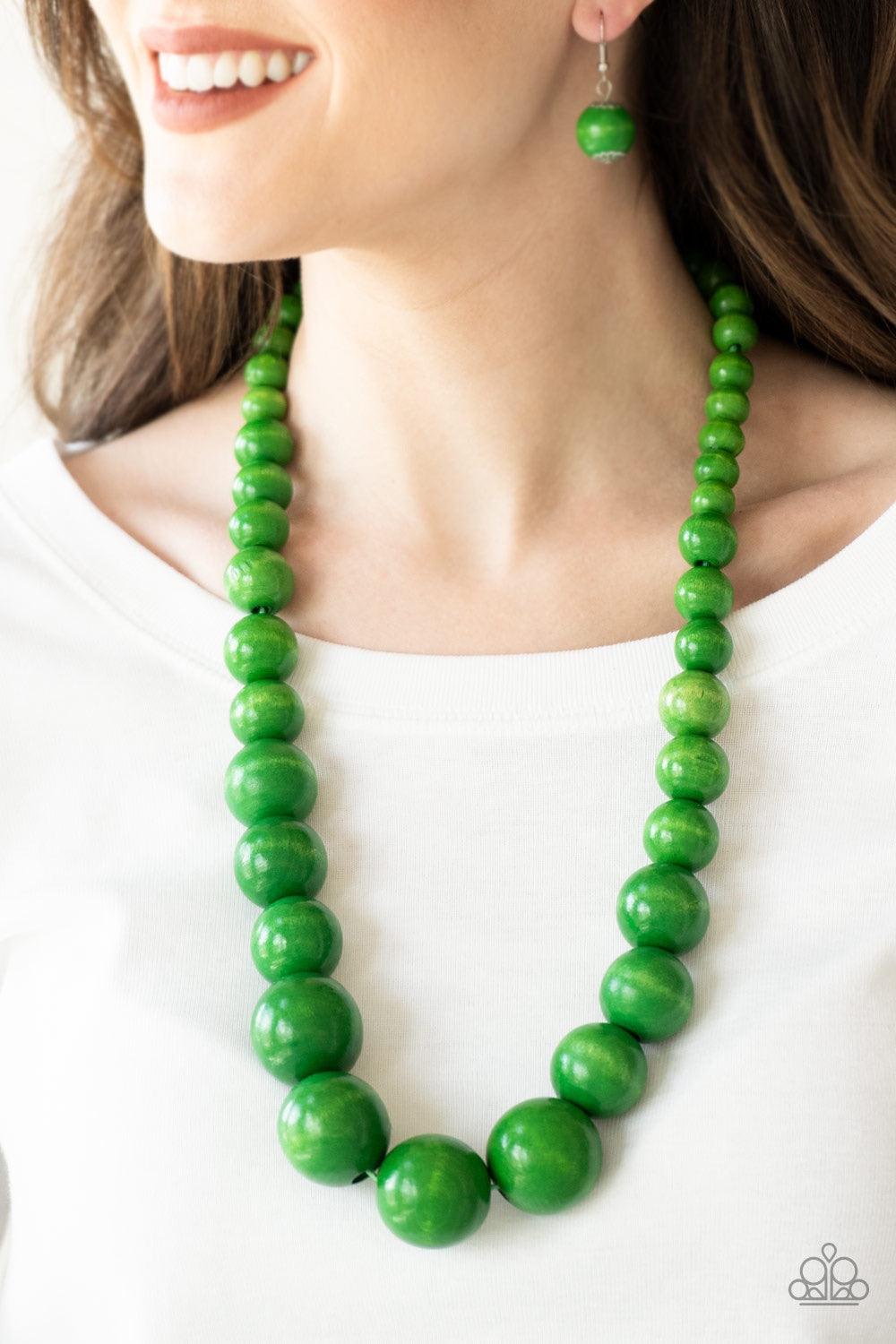 Paparazzi Accessories Effortlessly Everglades - Green Gradually increasing in size near the center, vivacious green wooden beads are threaded along a green string for a summery look. Features an adjustable sliding knot closure. Jewelry