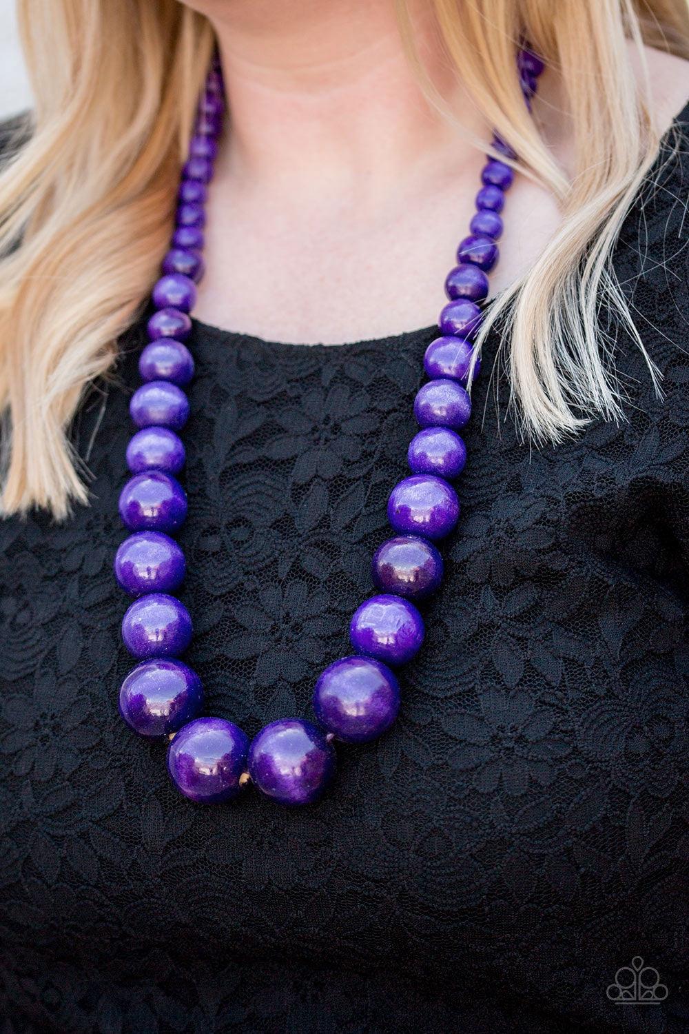 Paparazzi Accessories Effortlessly Everglades - Purple Gradually increasing in size near the center, vivacious purple wooden beads are threaded along a purple string for a summery look. Features an adjustable sliding knot closure. Jewelry