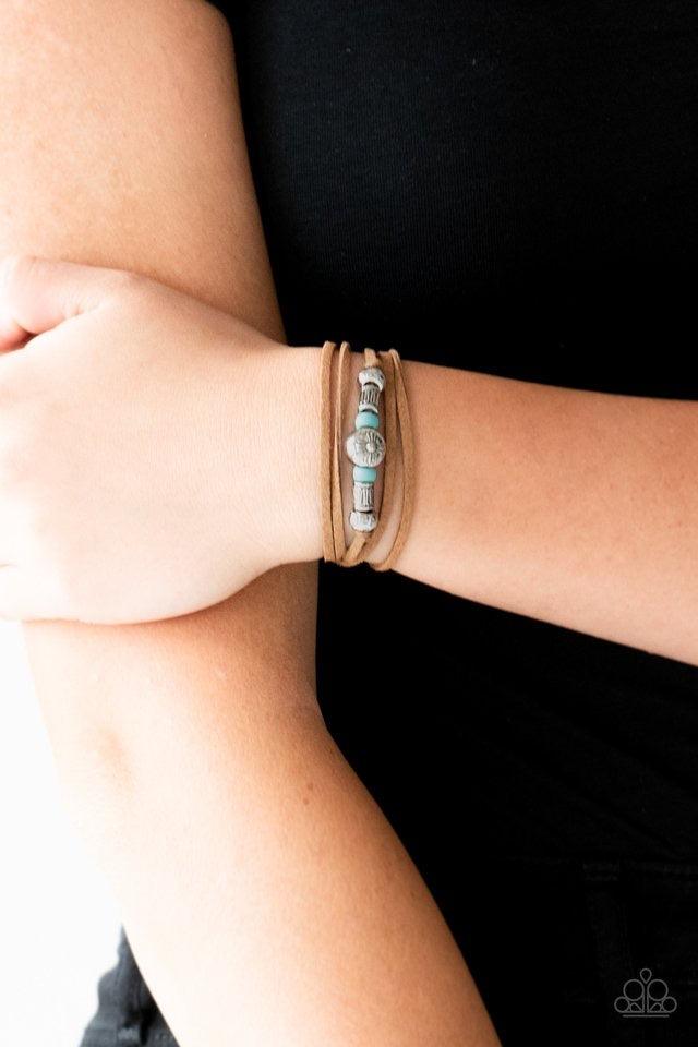 Paparazzi Accessories Find Your Way - Blue An array of blue and silver beads are knotted in place along elongated suede cording for a wanderlust fashion. To secure bracelet, tie ends in place around the wrist at desired length. Sold as one individual brac