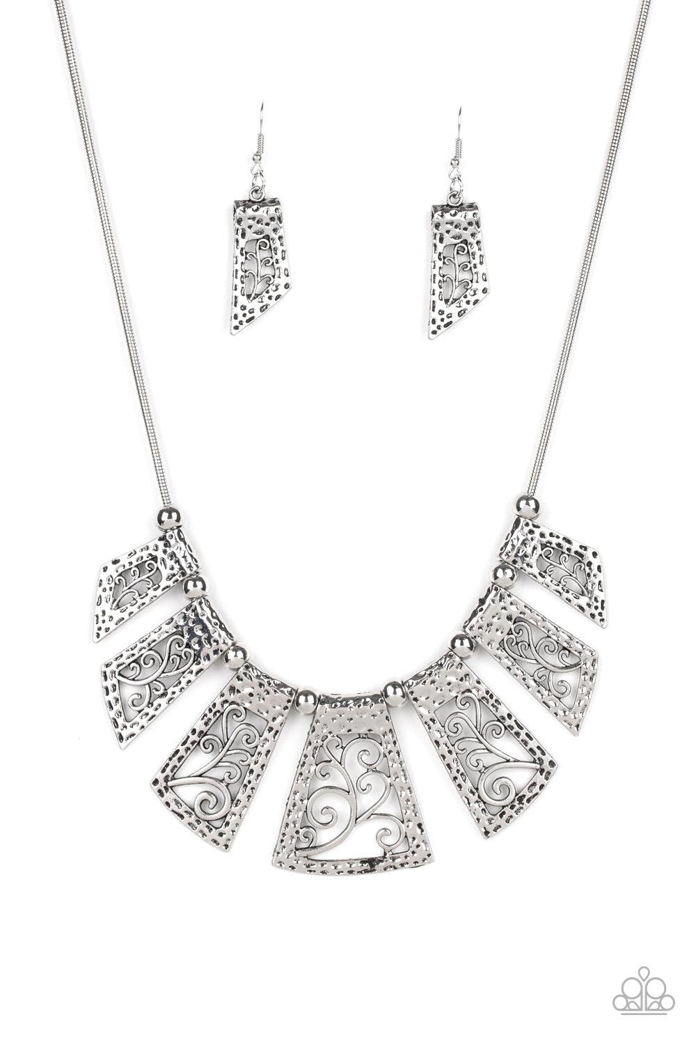 Paparazzi Accessories Vintage Vineyard ~Silver Infused with antiqued silver beads, a collection of hammered silver frames filled with vine-like filigree slide along a sleek silver chain below the collar for a statement-making finish. Features an adjustabl