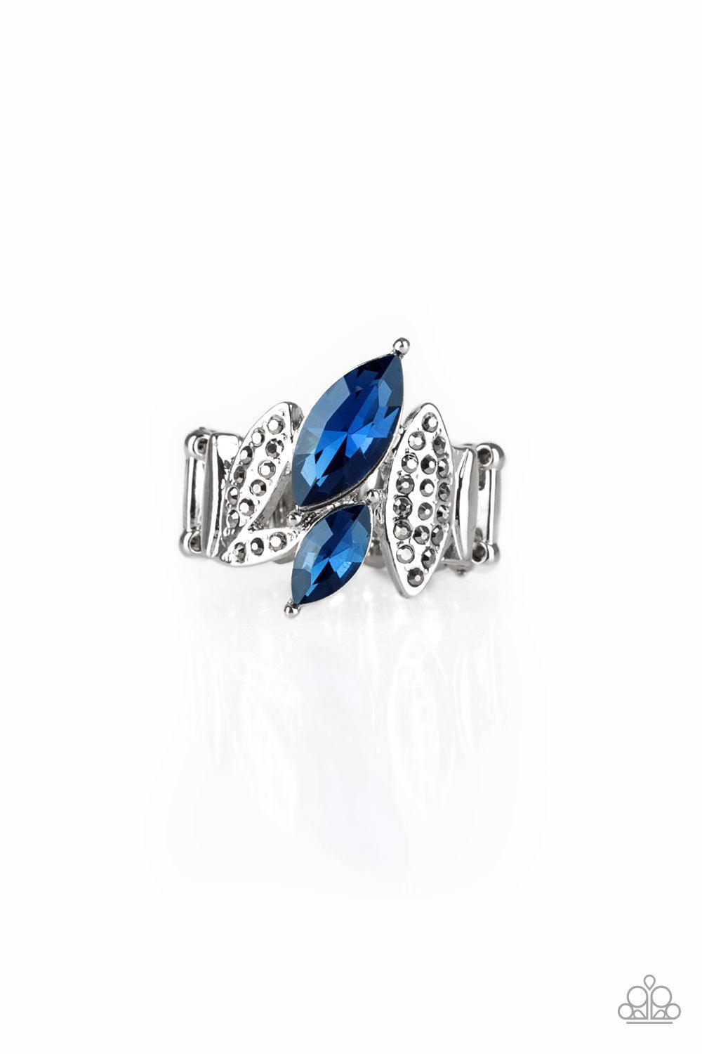 Paparazzi Accessories Stay Sassy - Blue Featuring elegant marquise style shapes, hematite rhinestone encrusted silver frames and glittery blue rhinestones connect across the finger for an edgy-glamorous look. Features a stretchy band for a flexible fit. S