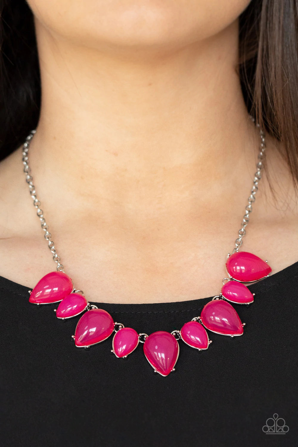 Paparazzi Accessories Pampered Poolside - Pink Featuring silver pronged fittings, large and medium glassy pink teardrops fan out below the collar, creating a vibrant fringe. Features an adjustable clasp closure. Sold as one individual necklace. Includes o