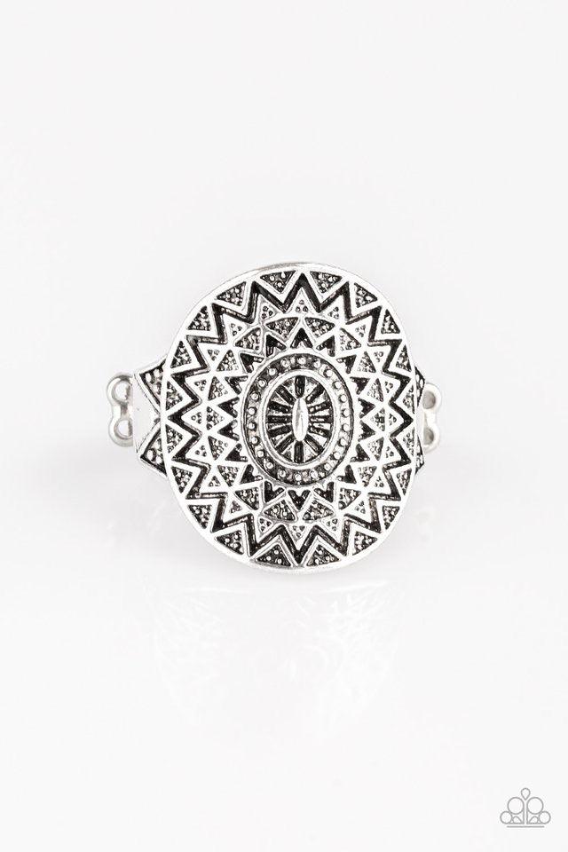 Paparazzi Accessories Good For The SOL - Silver Brushed in an antiqued shimmer, a glistening silver frame radiates with a sunburst pattern for a tribal inspired look. Features a dainty stretchy band for a flexible fit. Jewelry